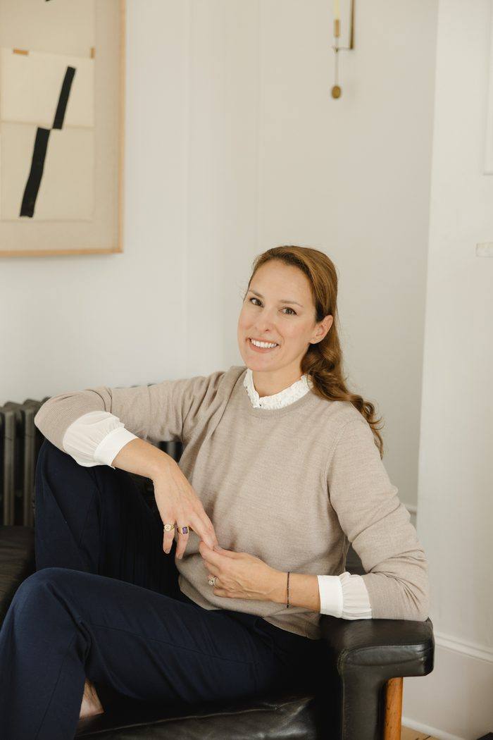 Anastasia Roumelioti seated, looking to camera